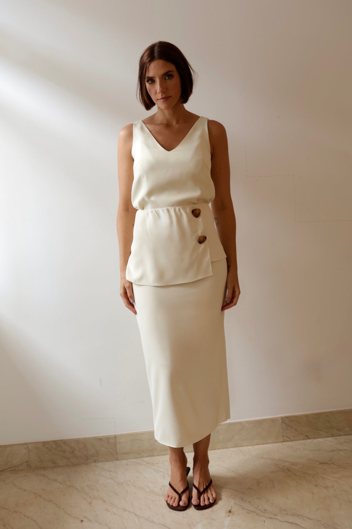 Saia Bruna Peplum Solto